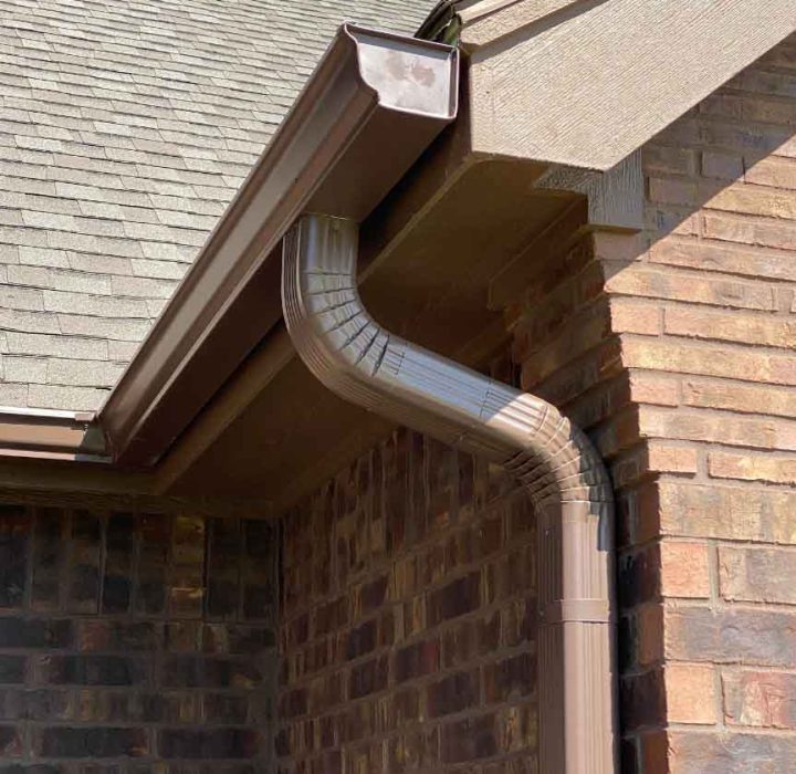 The painted roof and the gutter that was installed match exactly.